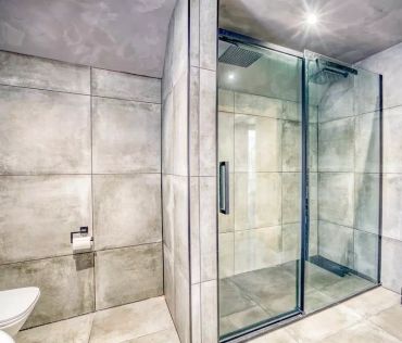 Glass shower enclosure installation